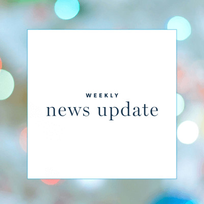 A white square with text "weekly news update," surrounded by a border with dots of light