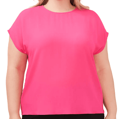 A woman wearing a pink shirt