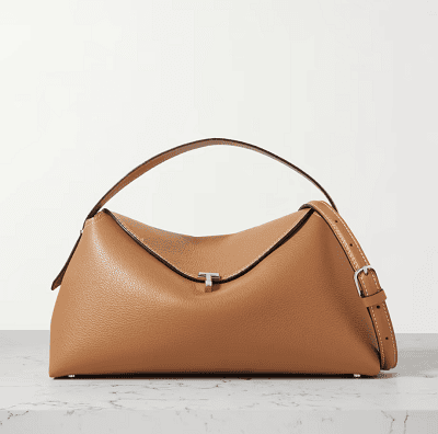 caramel colored handbag with short strap and top flap