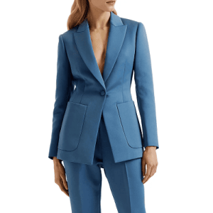 woman wears blue suit