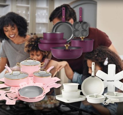 Family Cooking In The Kitchen Surrounded By Pots And Pans