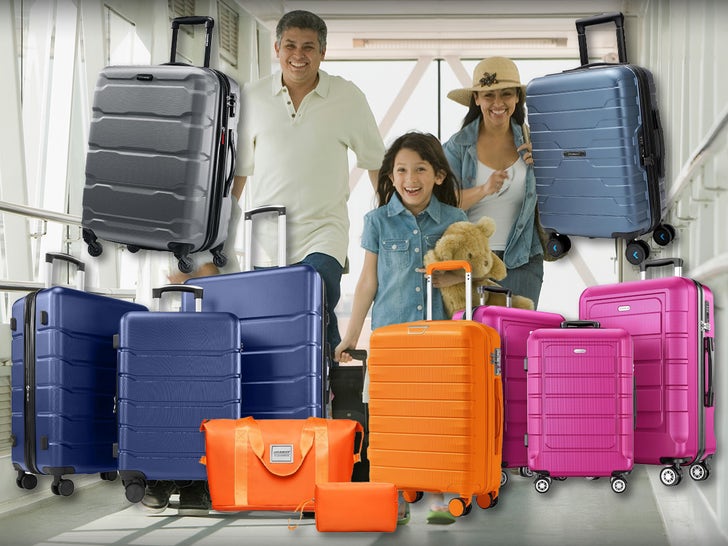 Family Walking Through The Airport Surrounded By Luggage