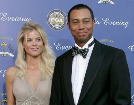 DETROIT - SEPTEMBER 15:  USA team member Tiger Woods with his fiance Elin Nordegren arriving at the 35th Ryder Cup Matches Gala Dinner at the Fox Theater on September 15, 2004 in Detroit, Michigan. (Photo by Andrew Redington/Getty Images)