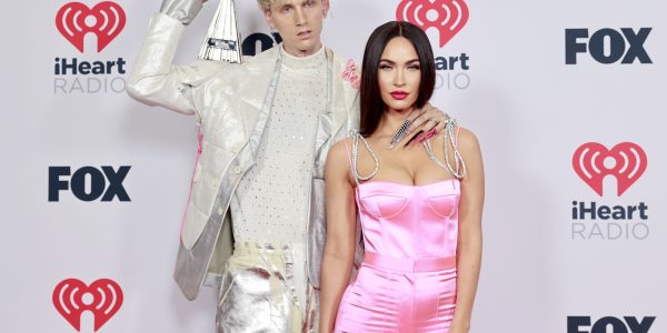 Machine Gun Kelly, winner of the Alternative Rock Album of the Year award for 'Tickets To My Downfall,’ and Megan Fox attend the 2021 iHeartRadio Music Awards at The Dolby Theatre in Los Angeles, California, which was broadcast live on FOX on May 27, 2021.