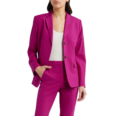 woman wears "wildflower" pink suit