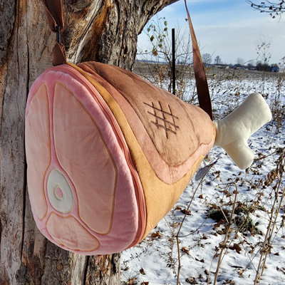 plush bag looks like a cartoonish grilled haunch of ham
