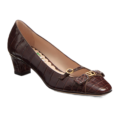 brown leather pumps with croc effect and tiny mary jane strap across front of foot with a flat bow at the toe