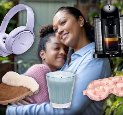Mother And Daughter Hugging Surrounded By Gifts From Amazon