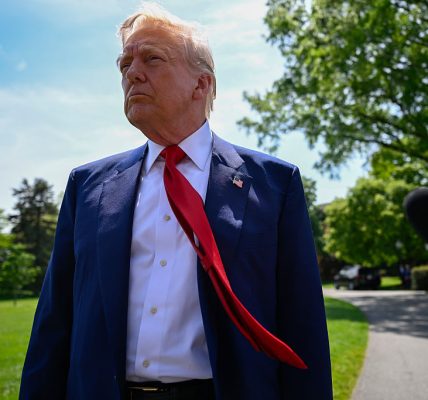 President Trump talks with reporters
