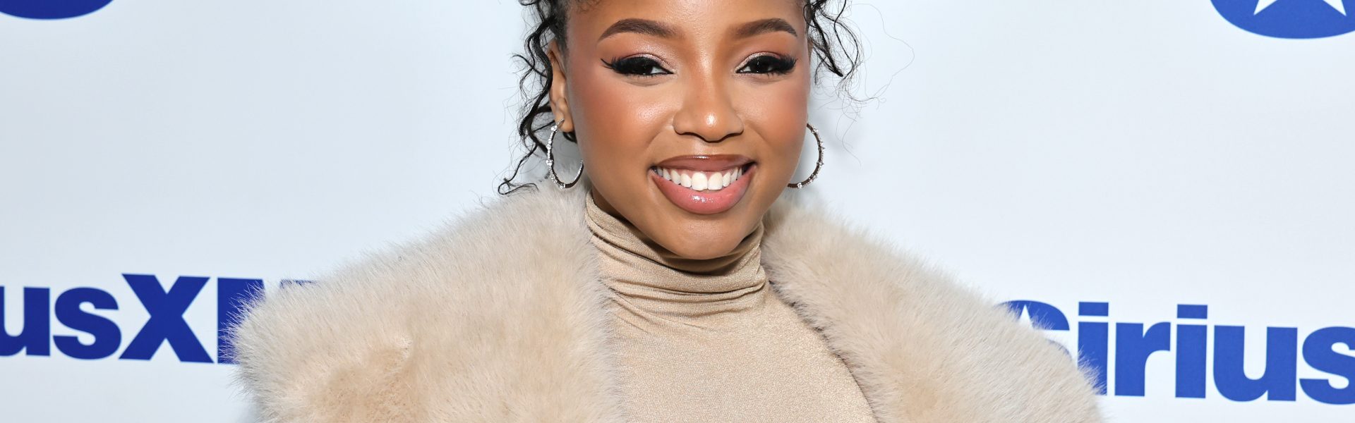 Chloe Bailey Turns Heads At St. Lucia's Carnival With Fire Fit & Killer Curves