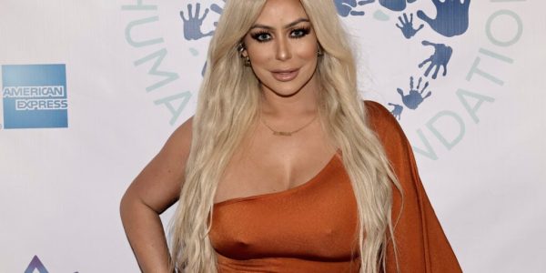 Aubrey O'Day arrives at the launch of the DermKing Humanity Foundation on November 05, 2023 in Los Angeles, California.