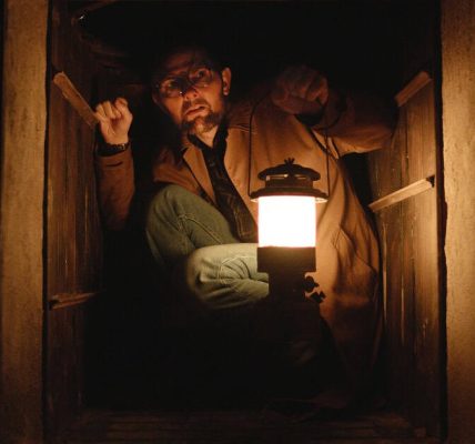 The horror film Hokum, starring Adam Scott, has secured a May 2026 release and unveiled the first image of Scott's character