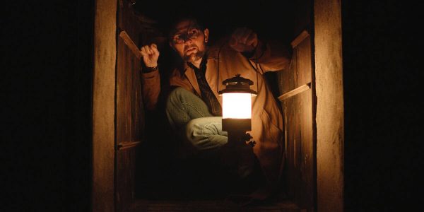 The horror film Hokum, starring Adam Scott, has secured a May 2026 release and unveiled the first image of Scott's character