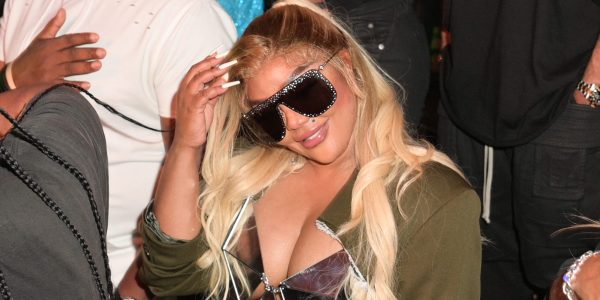 Lil Kim Makes Spicy Commentary Her Face Card Video Social Media Reactions