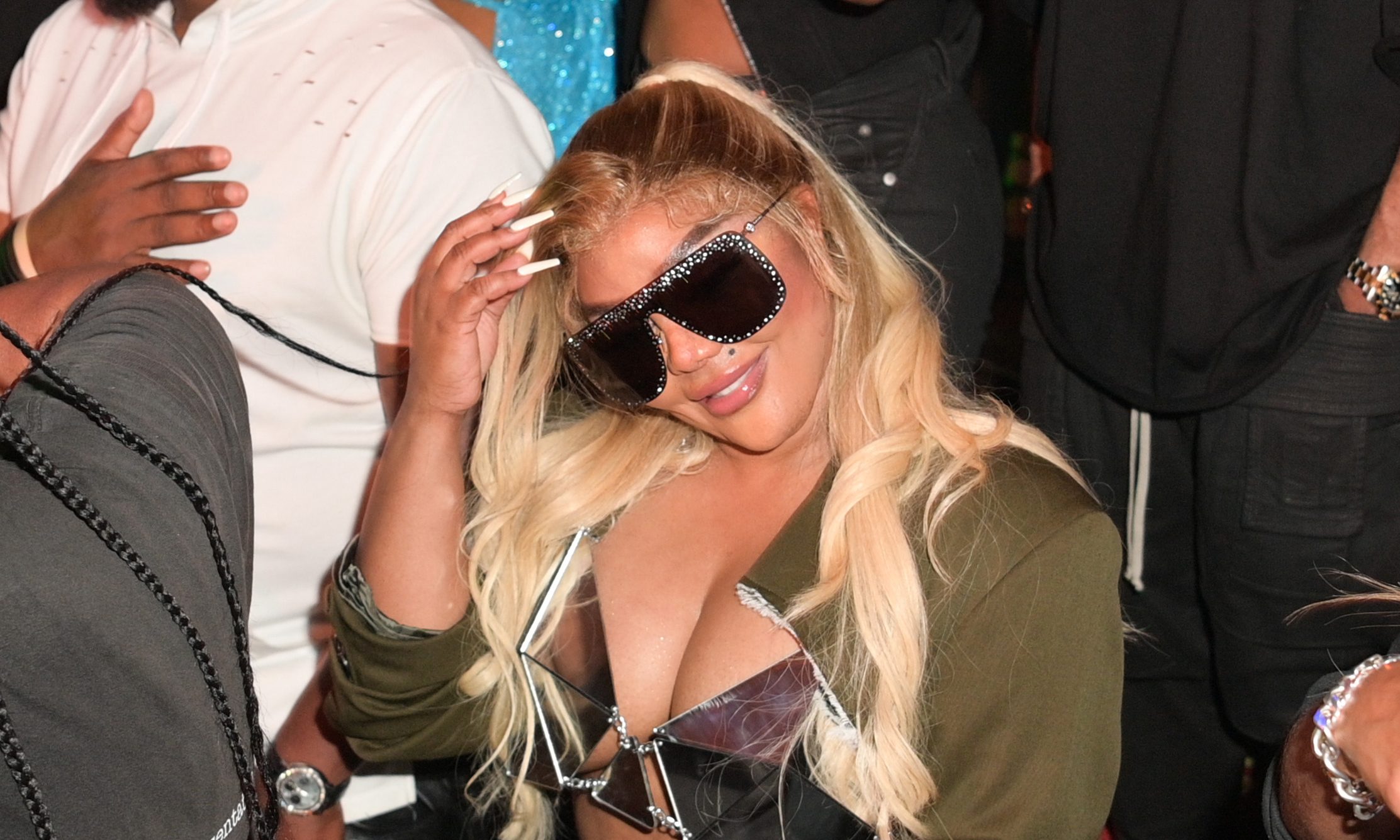 Lil Kim Makes Spicy Commentary Her Face Card Video Social Media Reactions