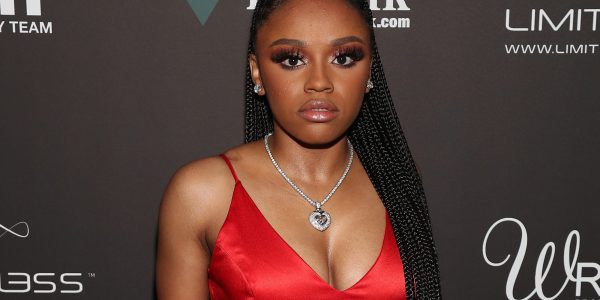 Yaya Mayweather Responds To Shade About Her Outfit At Lakers Game With Her Dad & Son