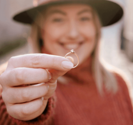 Plus Size Woman Holding Engagement Ring