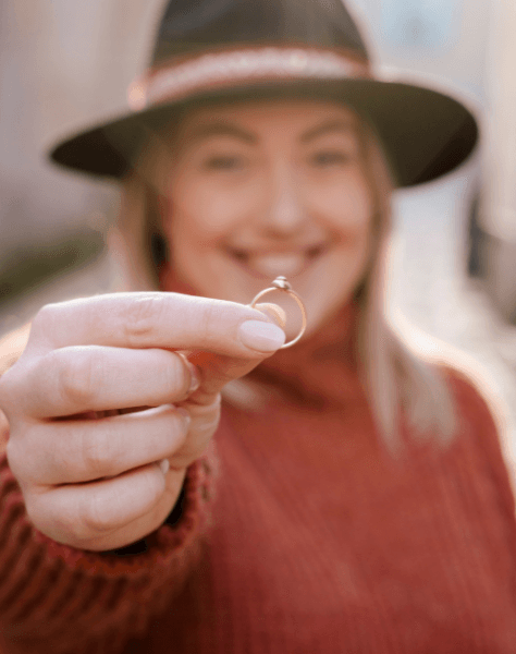 Plus Size Woman Holding Engagement Ring