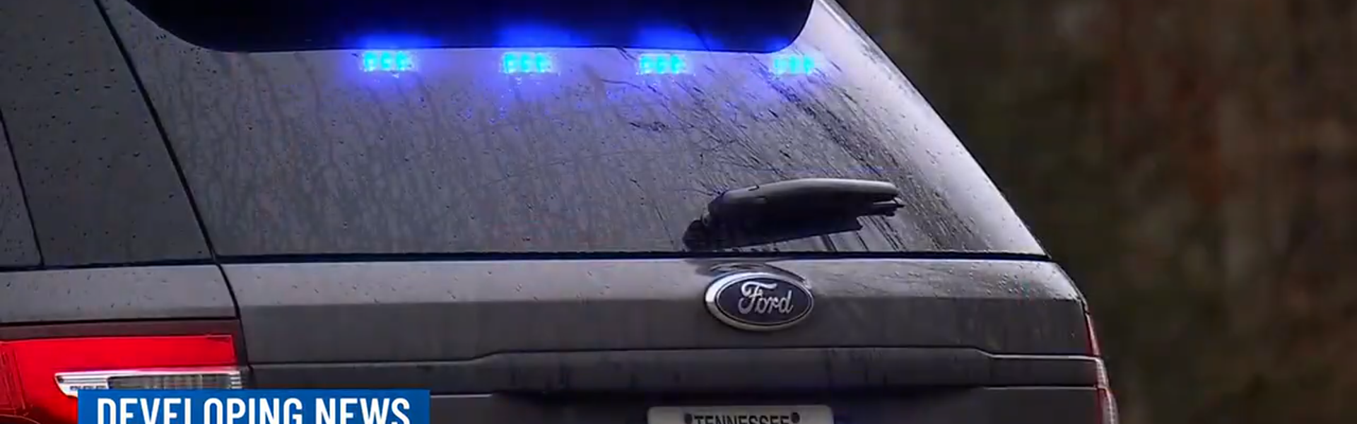 A news image featuring police lights.