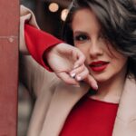 Camel jacket and red outfit
