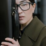 Lady with coat and briefcase