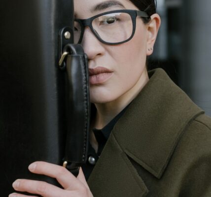 Lady with coat and briefcase