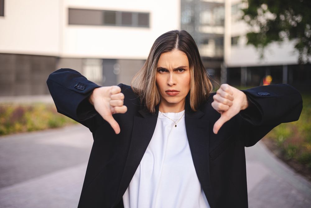 Woman Thumb down