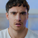 Disgusted confused young Caucasian man