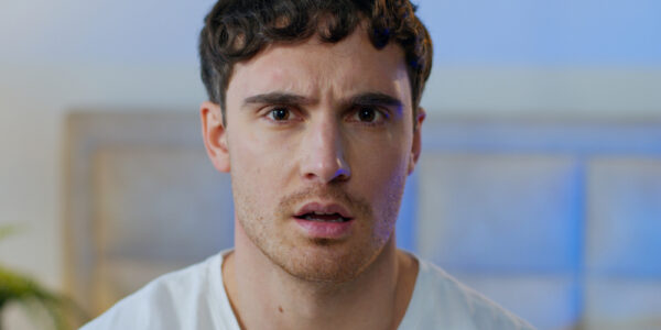 Disgusted confused young Caucasian man
