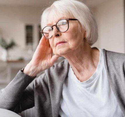 Sad tired lonely senior woman. Image credit Inside Creative House via Shutterstock