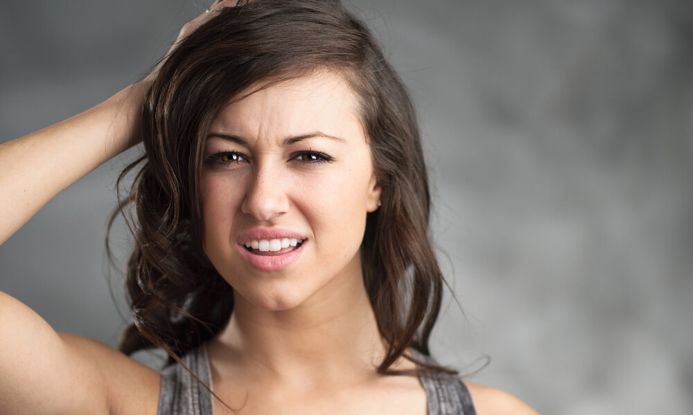 Confused Young Caucasian Woman
