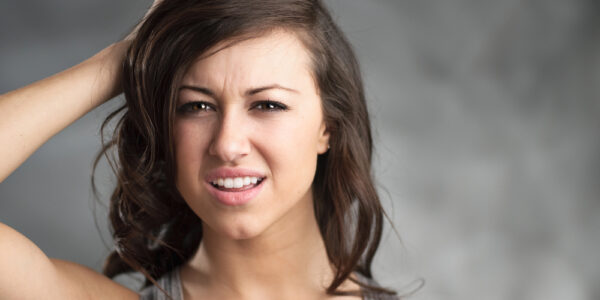Confused Young Caucasian Woman
