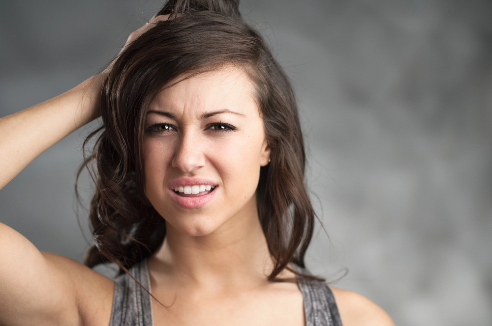 Confused Young Caucasian Woman