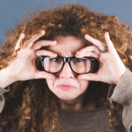 Nerd Woman on Gray Background