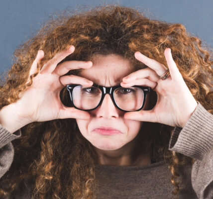 Nerd Woman on Gray Background