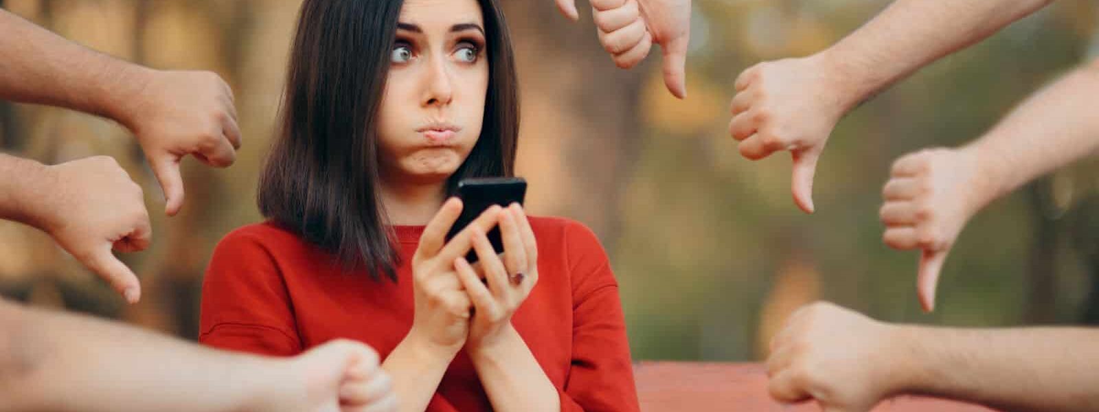 lady receiving thumbs down