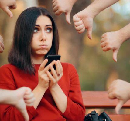 lady receiving thumbs down