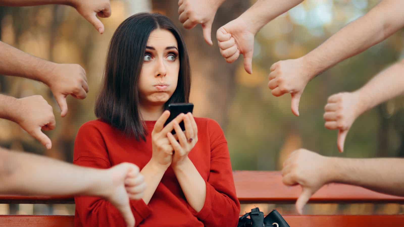 lady receiving thumbs down