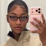 Angel Reese Wears Reebok Sneakers with Cutout Top and Micro Shorts