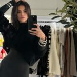 Brooks Nader Unbuttoned Shirt Creates Daring Plunge Look