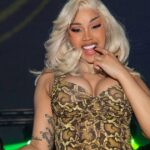 Cardi B Shines in Deeply Plunging Nude Bodysuit