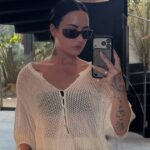 Demi Lovato Wears Sheer Strapless Top with Low Hangs