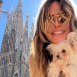 Plunging Leather Gown by Heidi Klum Features Bold Thigh-High Slit