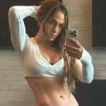 Plunging Micro Minidress by Jennifer Lopez Rides High on Thighs