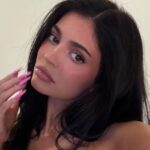 Kylie Jenner Wows in Tiny Pink Bikini While Soaking Wet
