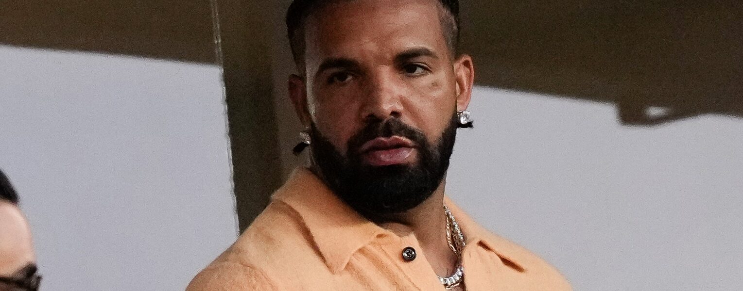 Who's That? Social Media Users Are Chattin' After Livestream Showed Drake With His Arm Around Mystery Woman (WATCH)
