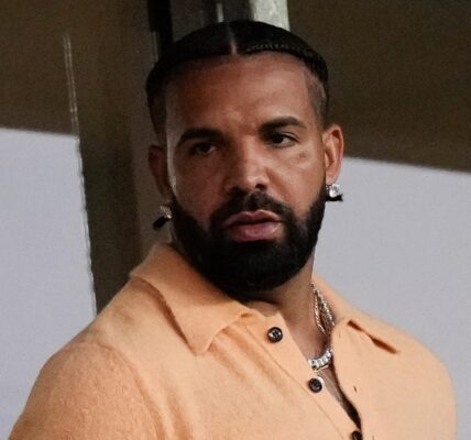 Who's That? Social Media Users Are Chattin' After Livestream Showed Drake With His Arm Around Mystery Woman (WATCH)