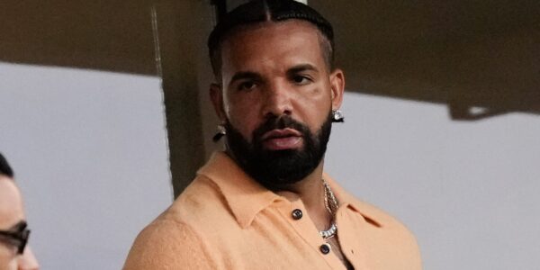 Who's That? Social Media Users Are Chattin' After Livestream Showed Drake With His Arm Around Mystery Woman (WATCH)
