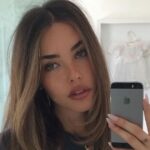 Low-Cut Bustier Highlights Madison Beer's Playful Curves