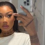 Latex Jumpsuit by Megan Thee Stallion Plunges to Waist